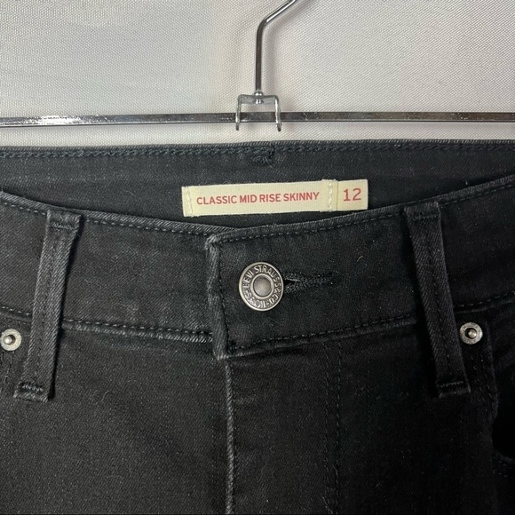 Levi's Classic Mid Rise Skinny Raw Hem Black Jeans 12 - Picture 3 of 4